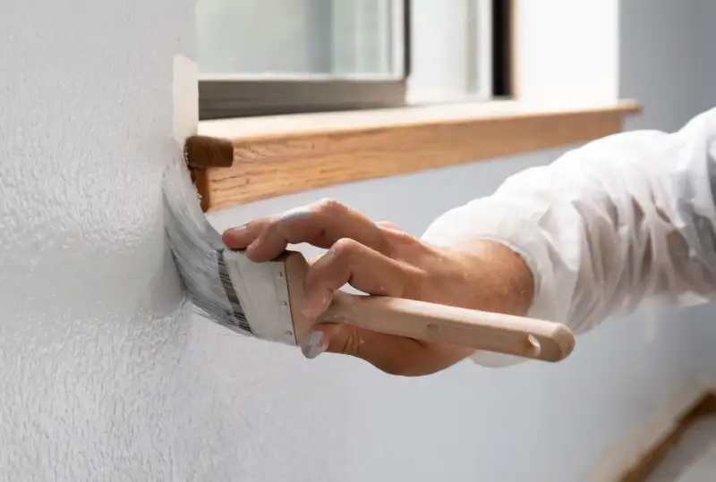 Precision in Every Brushstroke Hand Cutting in White Around Window
